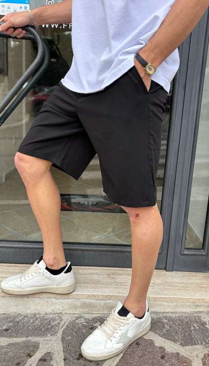 Pantaloni corti neri bottone