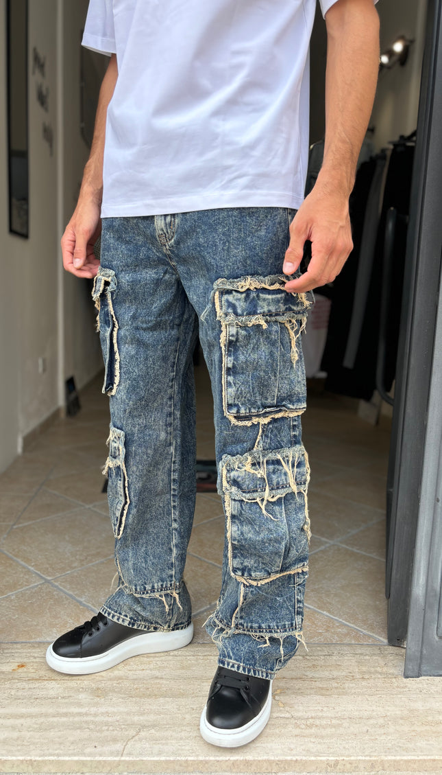 Pantalone jeans tasconi sfilacciato