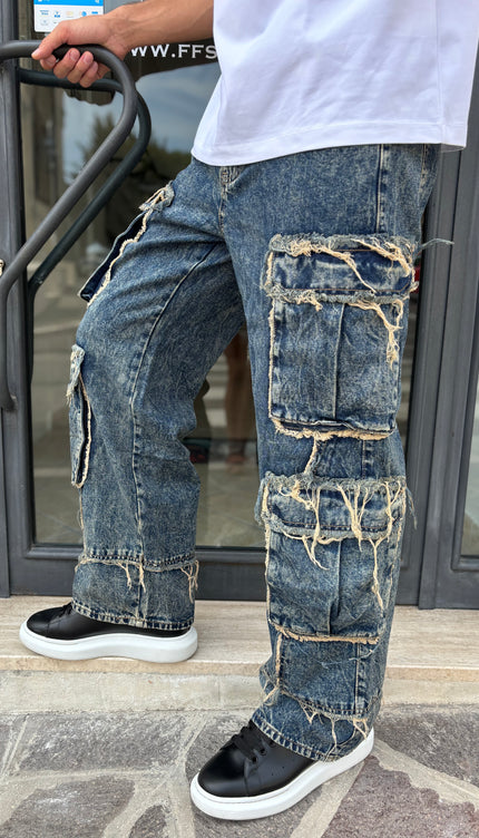 Pantalone jeans tasconi sfilacciato