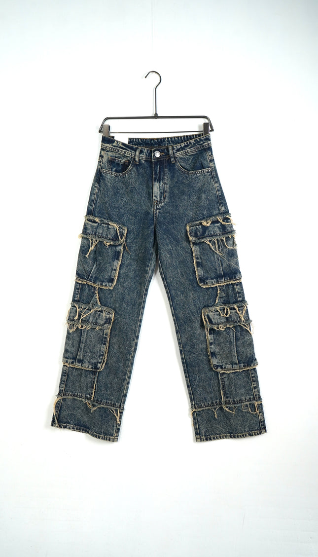 Pantalone jeans tasconi sfilacciato
